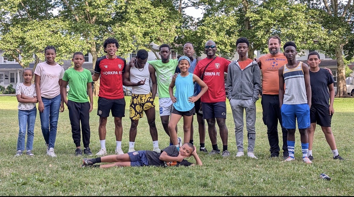 YorkPA FC youth players and coaches together at a York community park