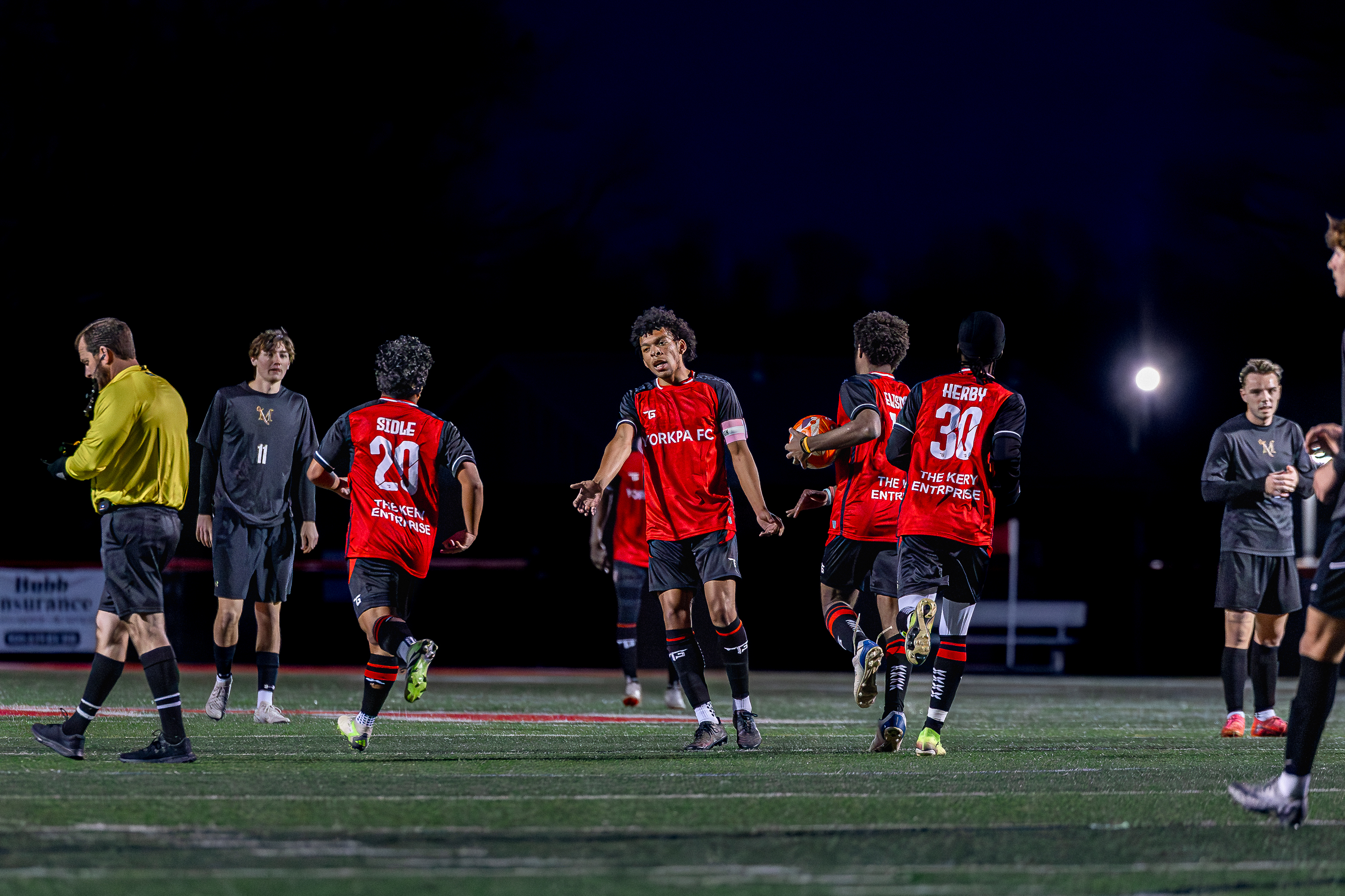 Team huddle on field